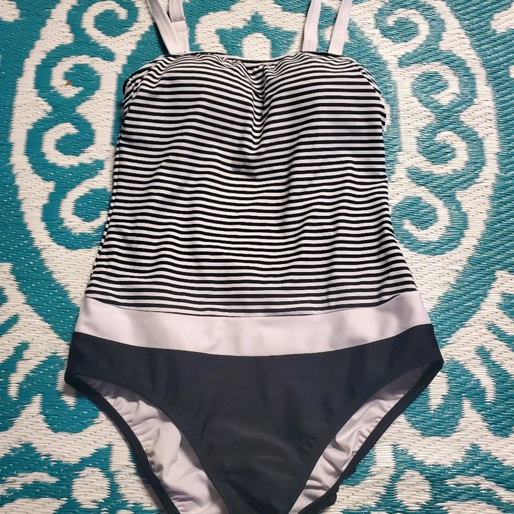 Venus one piece new without tags